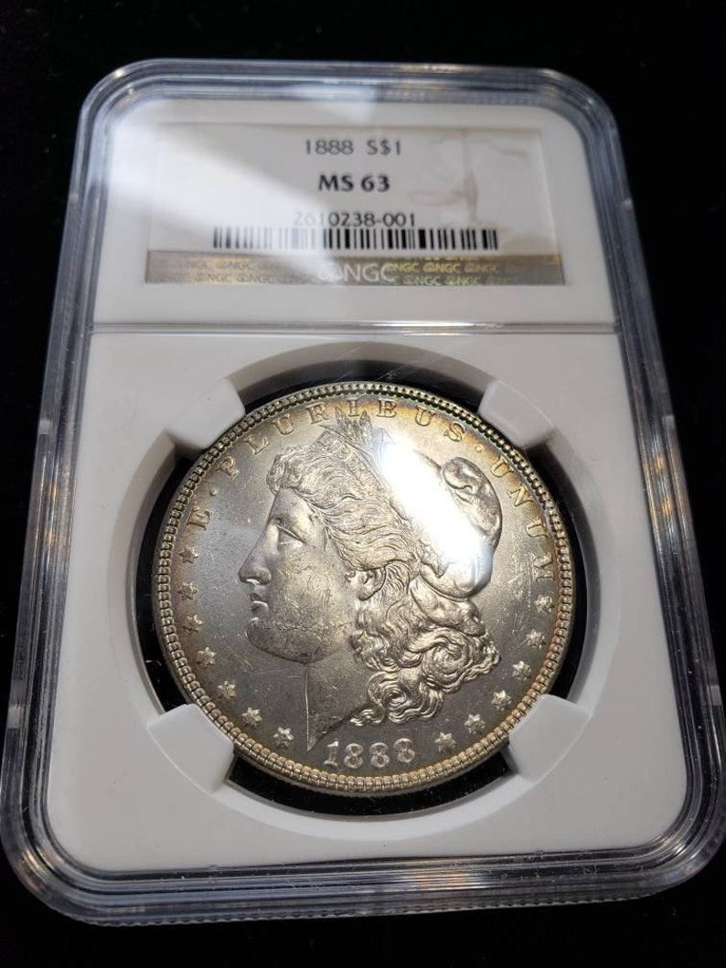 1888 Morgan Silver Dollar MS63 NGC Graded with Nice Toning Color Toned Coin along the rims.     Lot# 1463 - usacoinsstore