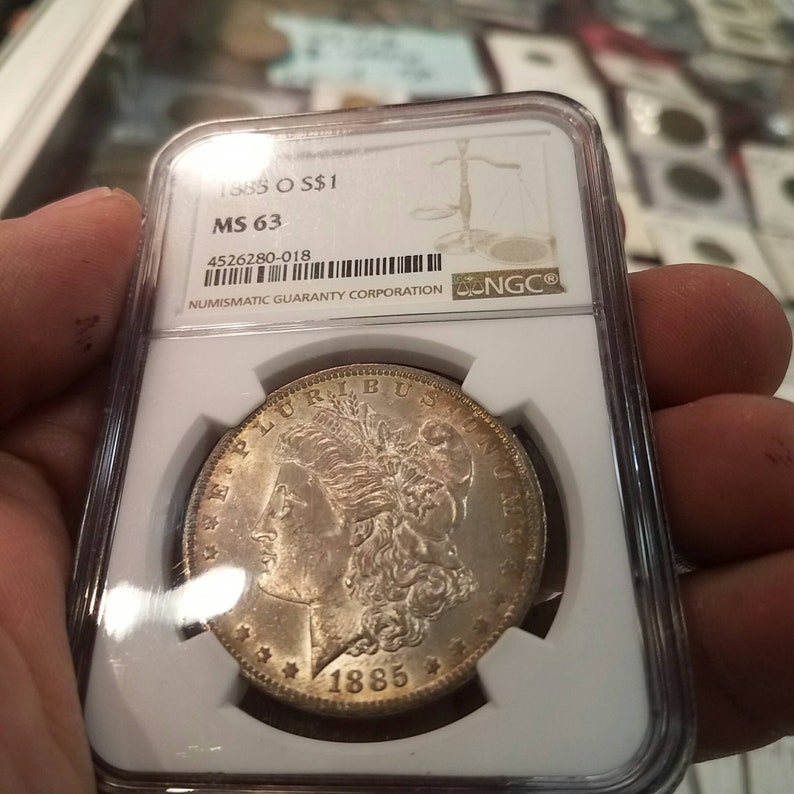 1885 O Morgan Silver Dollar, Nicely  Toned. NGC MS63 lot#226. - usacoinsstore