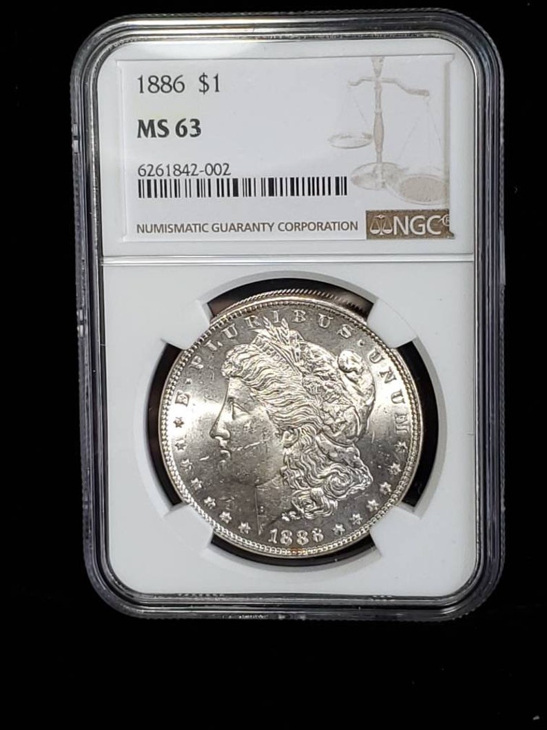 1886  MS 63 Silver Morgan Dollar, NGC  MS 63  Silver  Coin . Blast White!   Lot # 1491 - usacoinsstore