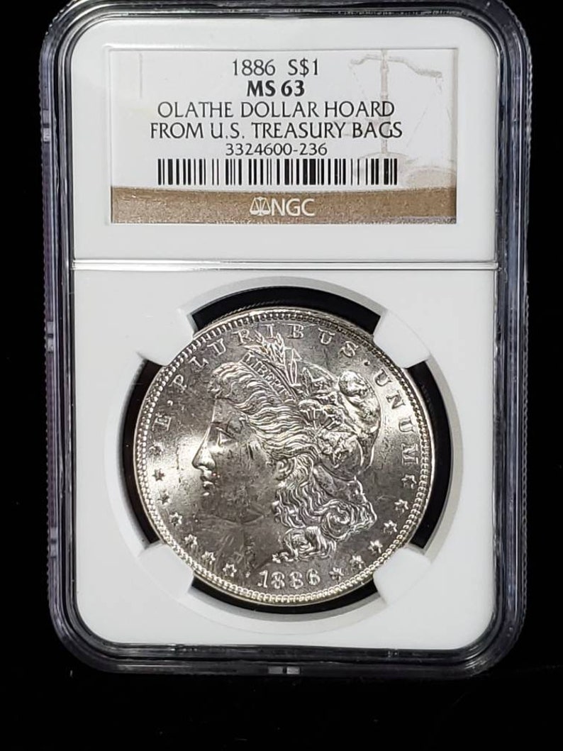 1886  MS 63 Silver Morgan Dollar, NGC  MS 63  Silver  Coin . Olathe Dollar Hoard - From the U.S Treasury Bags !    Lot # 1494 - usacoinsstore