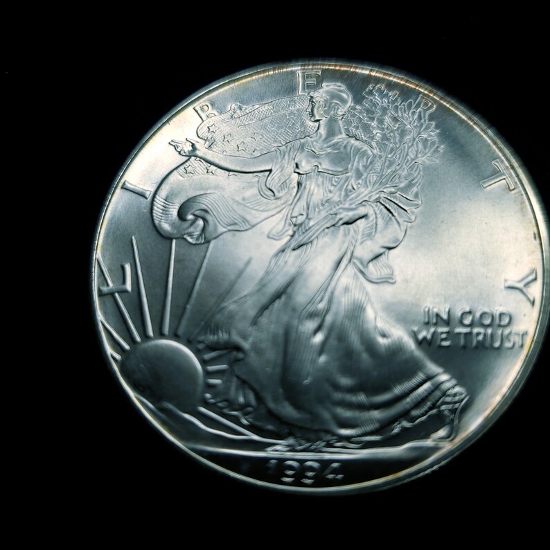 1994   American Silver Eagle  - Slightly  Toned    -  1 Oz .999 Tough  Key date   Lot# 84  Regular 89 - usacoinsstore
