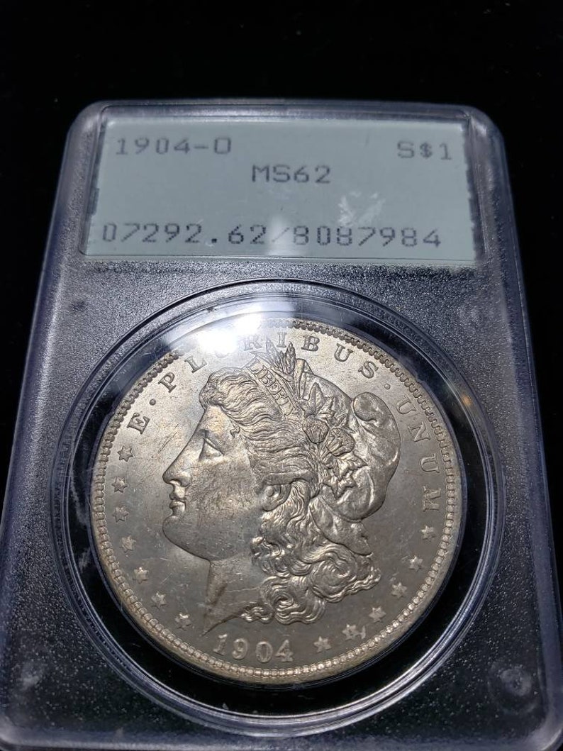 1904 O  Morgan Silver Dollar PCGS MS62, Old Green Rattler.   Lot # 1490 Regular 115 - usacoinsstore