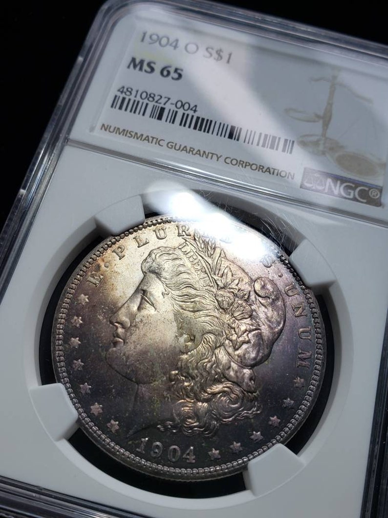 1904 O   Morgan Silver Dollar MS65  NGC   Graded - Beautiful color -Regular 440     Lot# 1466 - usacoinsstore