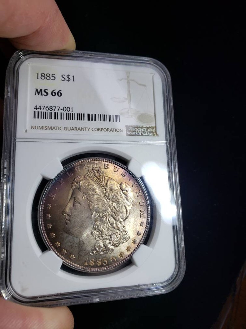 1885  Morgan Silver Dollar MS66 NGC   Graded - Beautiful color!! -    Lot# 1467. - usacoinsstore